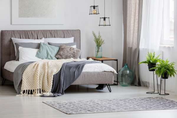 Perfect Placement Strategies To Layer Rugs In A Bedroom